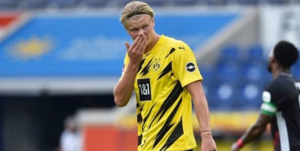  拜仁慕尼黑主场大胜多特蒙德，德甲榜首之争白热化